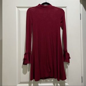 Red ribbed mock turtle neck dress with bell sleeve